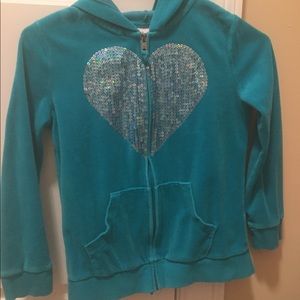 Blue jacket with sparkly heart